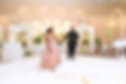 Couple getting ready for their frist dance in a beautiful setting with Platinum Pianist performing for them on a white piano