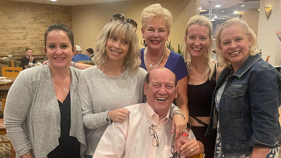 Malcolm Alls with his family
