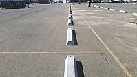 example of concrete wheel stop installation in dallas texas