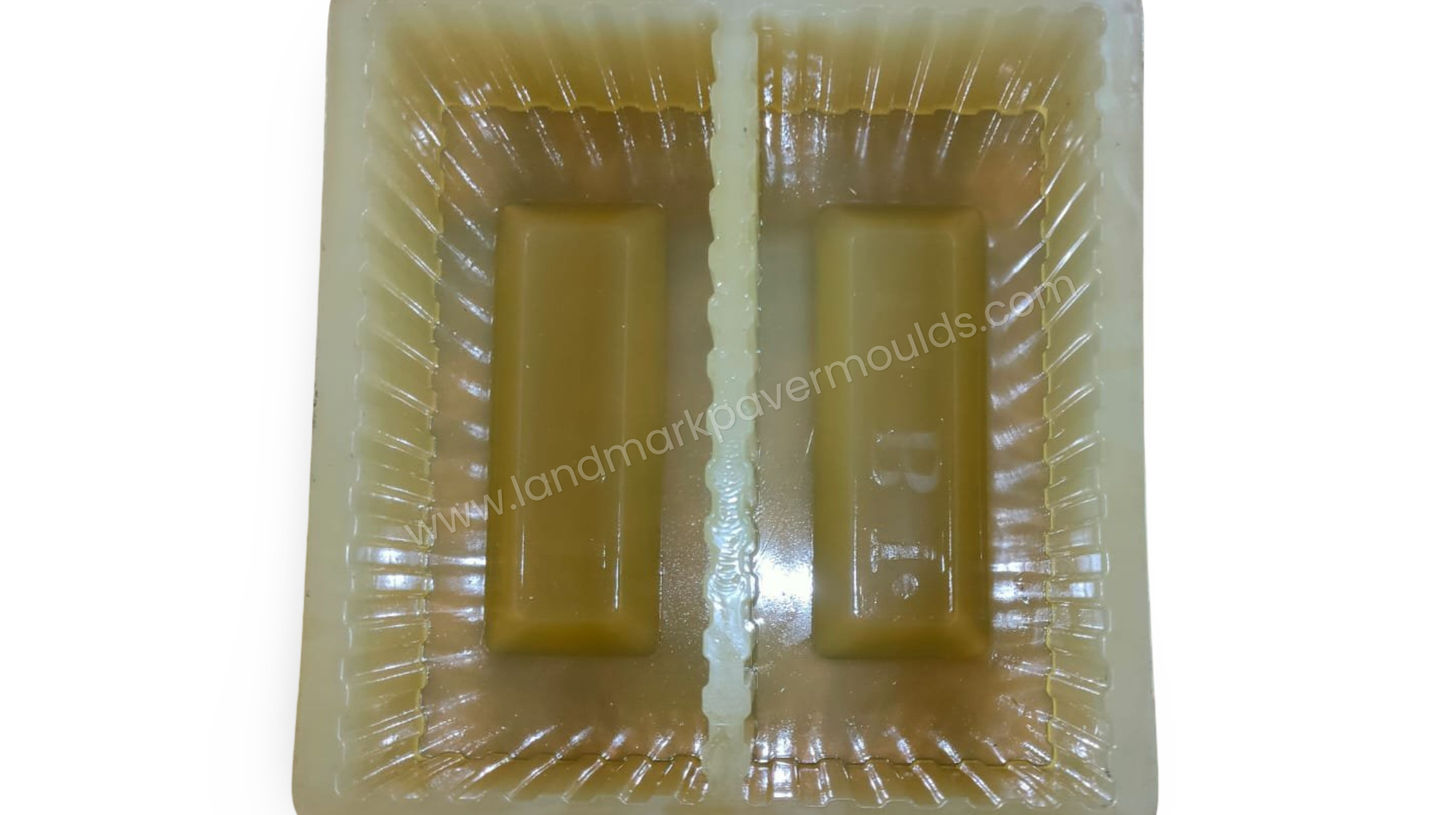 Close-up photo of a premium PVC construction brick mould (9x4x3 inch), highlighting its robust design and material quality.