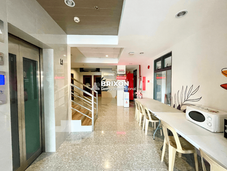 Clean hallway view showing elevator and modern design in a six-storey hotel building in Pampanga