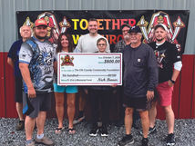 Titan Cornhole Supports Fr. Eric Vogt Memorial Fund with $600 Donation