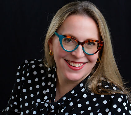 Erin Guinup Headshot Glasses.jpg