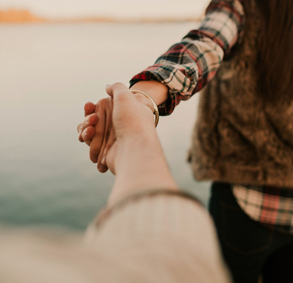 Holding Hands Outdoors_edited_edited.jpg