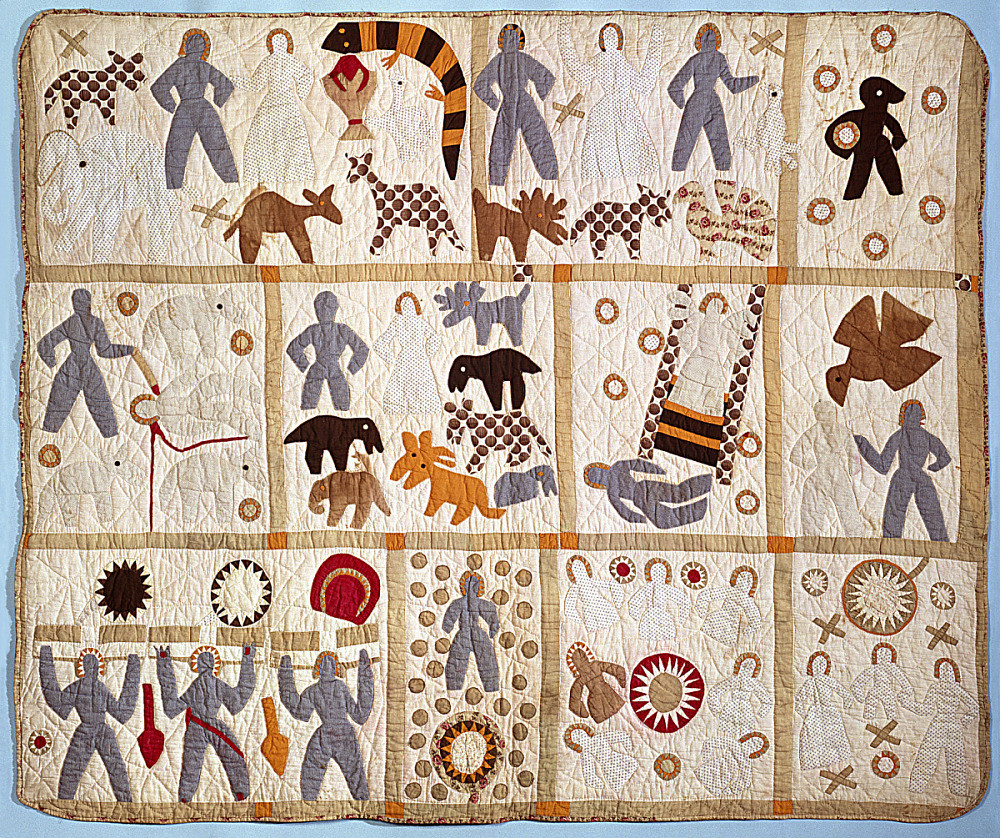 A photograph of Harriet Powers' Bible Quilt 1886.