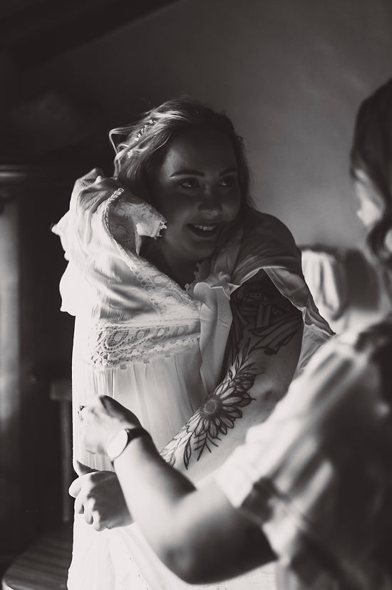 Italian wedding photography: a professional photographer captures a couple's intimate sunset vows in a stunning Tuscan vineya