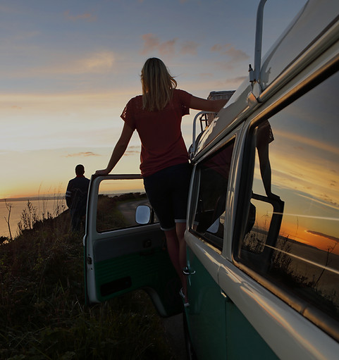 Guests enjoying a breathtaking African sunset during a private luxury safari in Tanzania