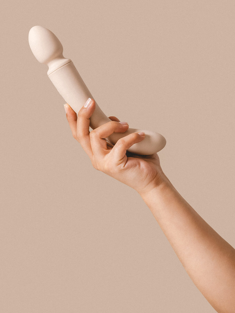Thumbnail: Hand holding a Cassia dual-ended vibrator