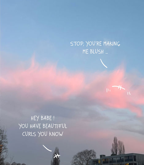 a photo of a tree and a pink cloud with drawn eyes, talking
