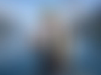 Private fjord fishing tour in Stavanger with guest holding cod in calm fjord surroundings