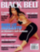 Woman in a martial arts pose on "Black Belt" magazine cover, October 2003. Text highlights self-defense and training articles.