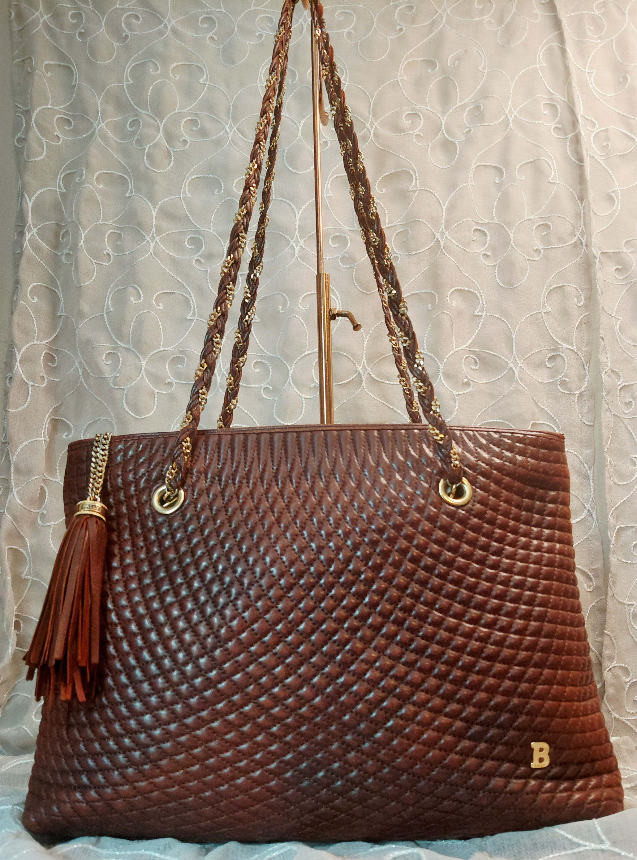 Vintage Bally brown quilted leather tote bag with braided chain straps and tassel