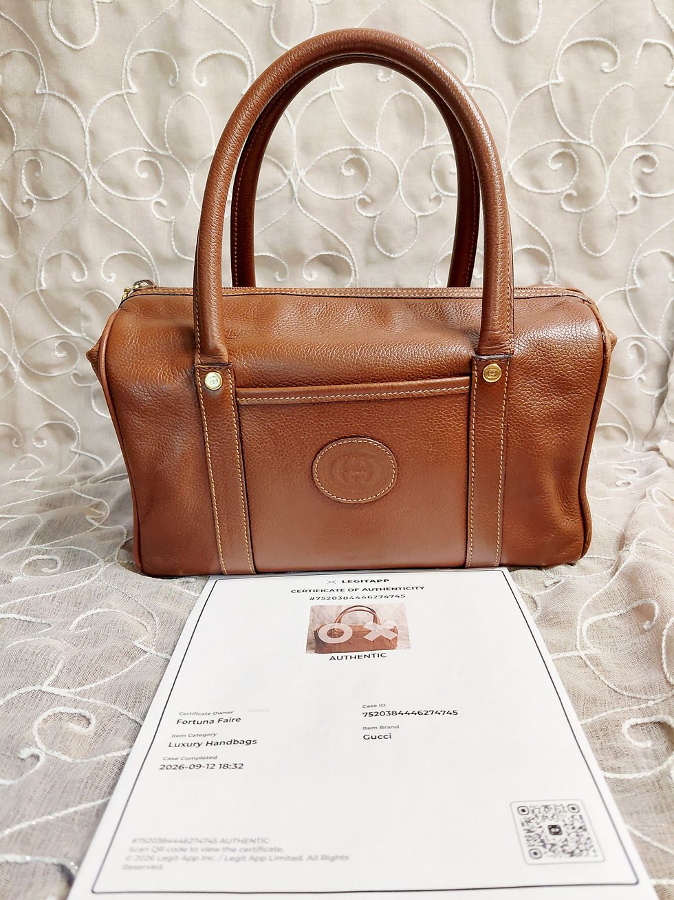 Authentic vintage Gucci brown leather Boston top handle bag displayed with LegitApp certificate of authenticity.