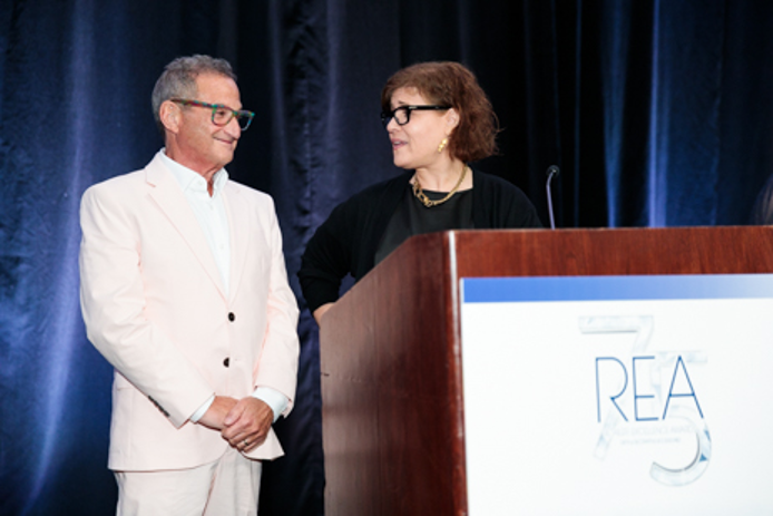 Amy Loewenberg, Chair of Gift for Life presented the Lifetime Humanitarian Award to Peter Schauben at the 75th Annual REAs.