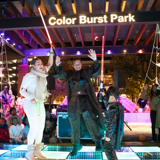 Families in halloween costumes