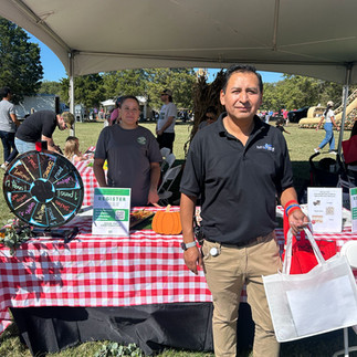 People holding a Bristow Center Branded bag