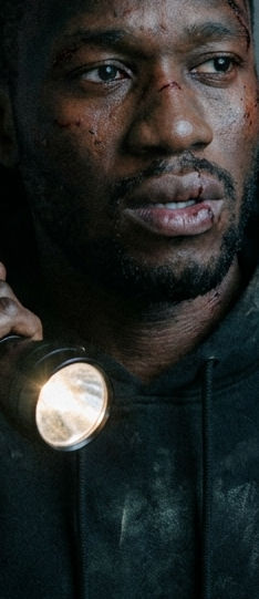 Worried_person_looking_around_torch_202607042339.jpeg