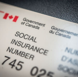 A Canadian Social Insurance Number (SIN) document issued by the Government of Canada, displaying the official Canadian flag.