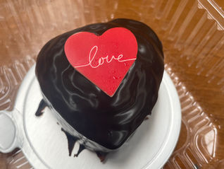Mini chocilate cake with a red chocolate heart