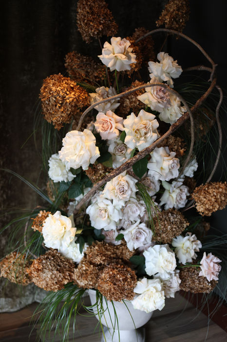 Elegant white and gold floral arrangement