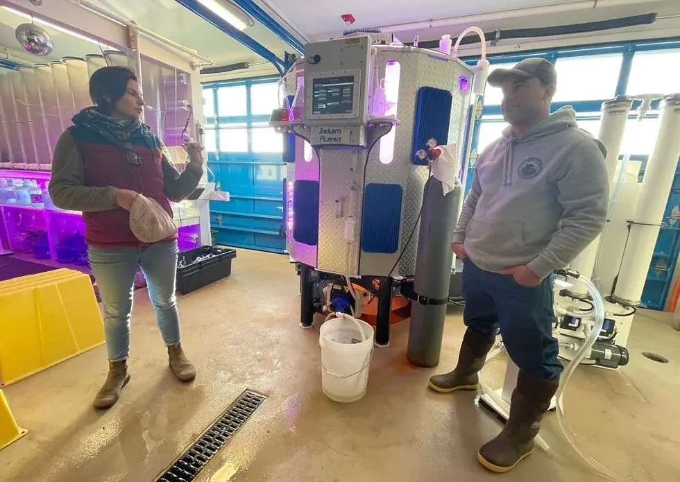 Town Biologist, Tara Riley, and Hatchery Technician, Joe Minella, demonstrate the capabilities of the PBR