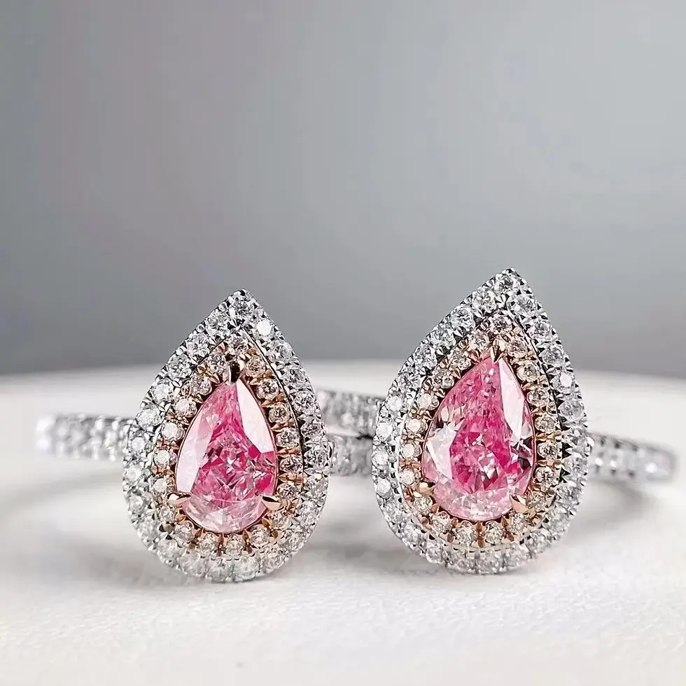 Thumbnail: Pink pear-shaped diamond earrings