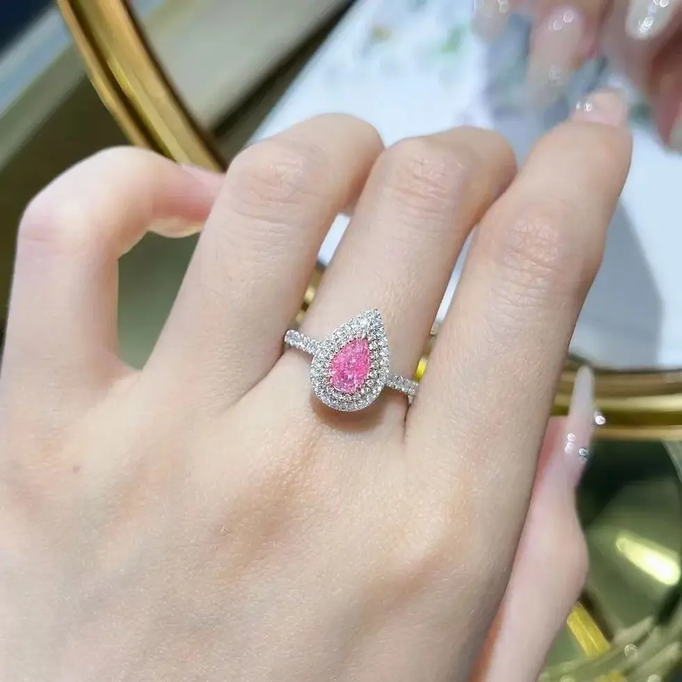 Thumbnail: Pink pear-cut gemstone ring