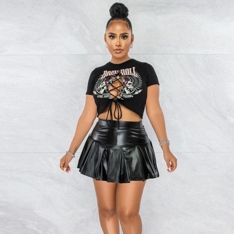 Thumbnail: Woman in black graphic tee and leather skirt