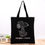 Thumbnail: Black tote bag with Snoopy design