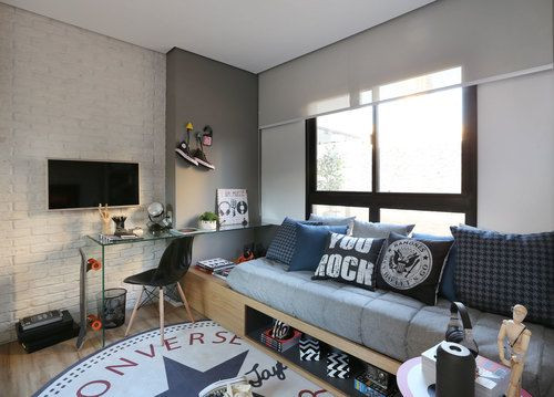 Quarto para jovem com escrivaninha.