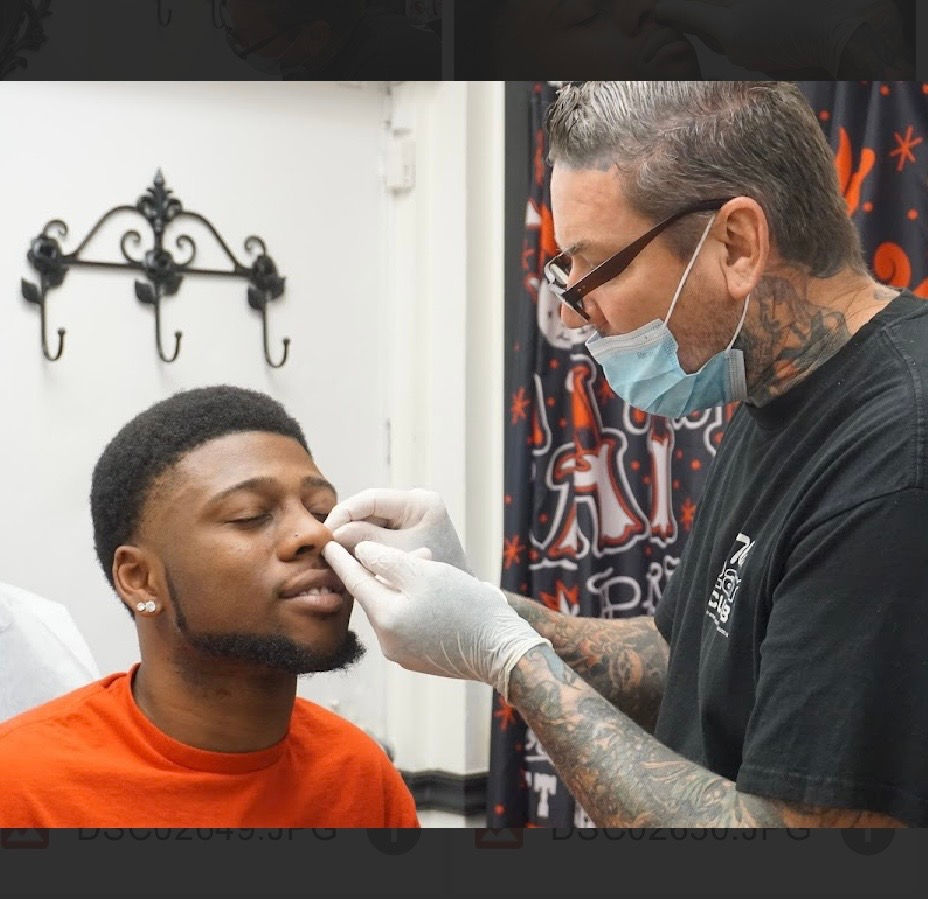 Angel-tattoo-nose-piercing-Tampa.jpg