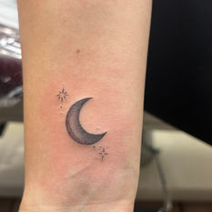 tiny matching moon tattoo at Angel tattoo tampa
