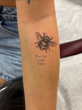 tiny bee tattoo best fine line tattoo in Tampa at Angel Tattoo Tampa oldest tattoo shop in Tampa