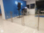 Fechamento de catraca em aço inox e portinhola com vidro temperado