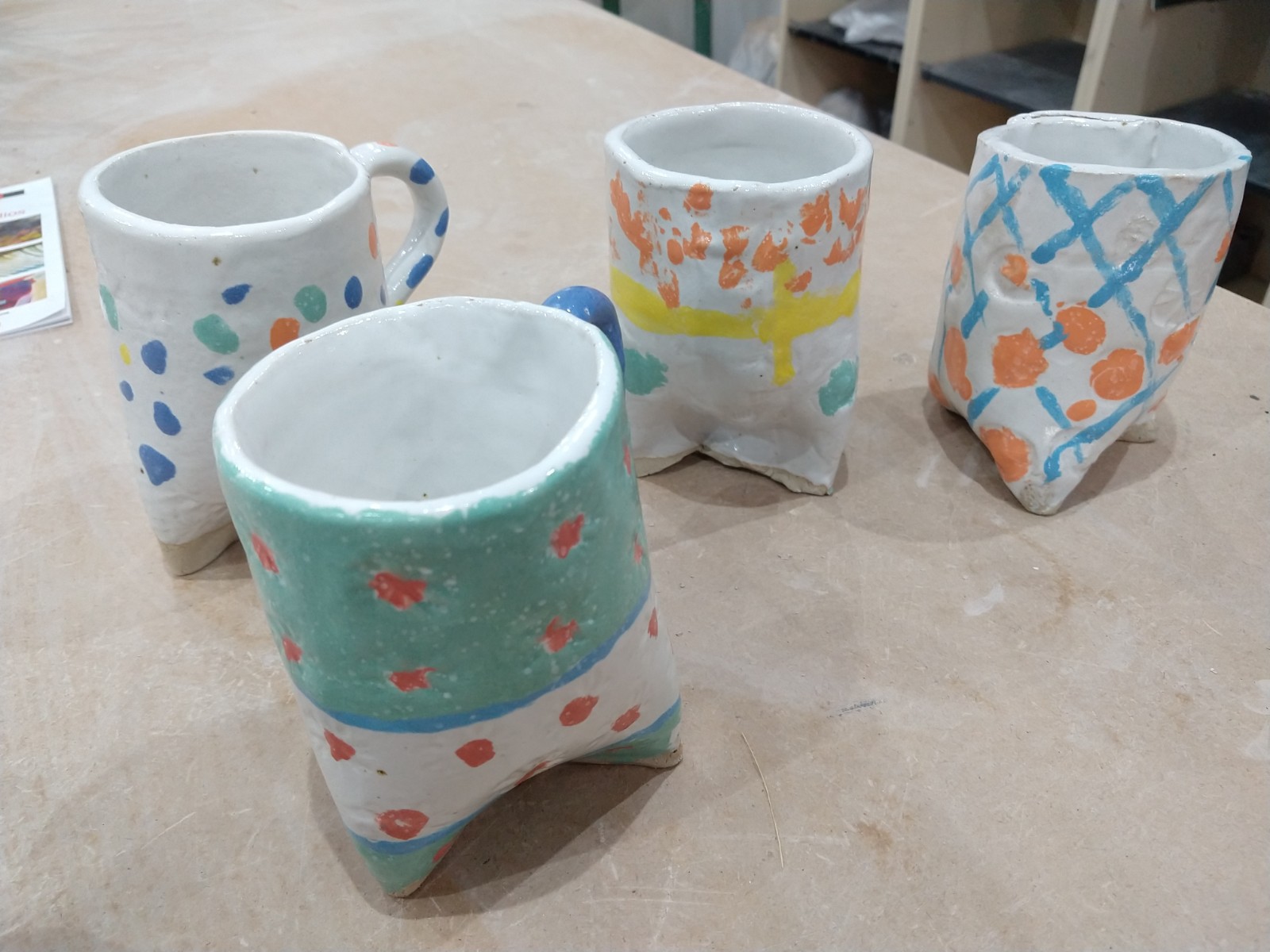 Three legged mugs made with our autistic