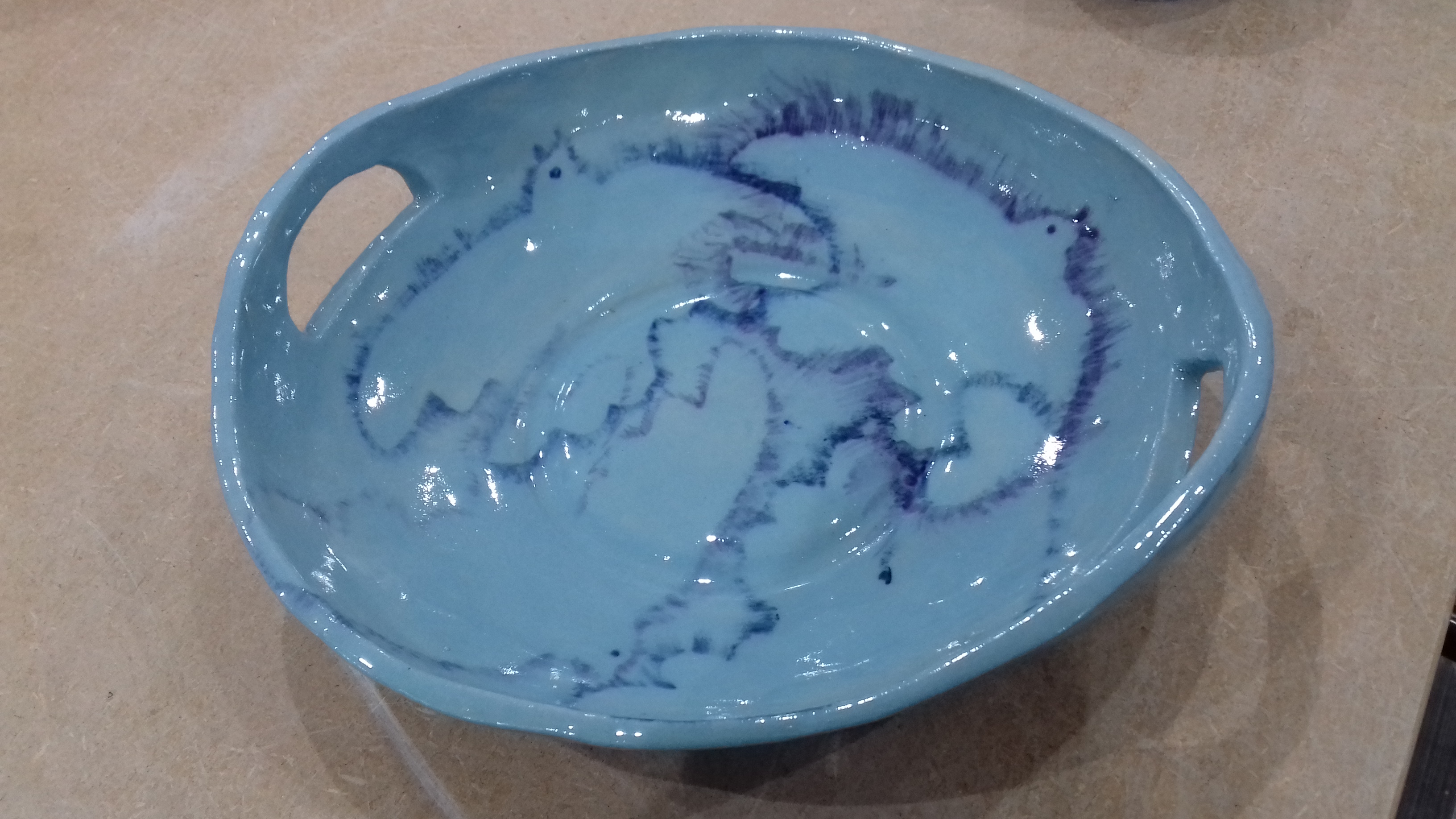 Underglaze on top of slip with clear over