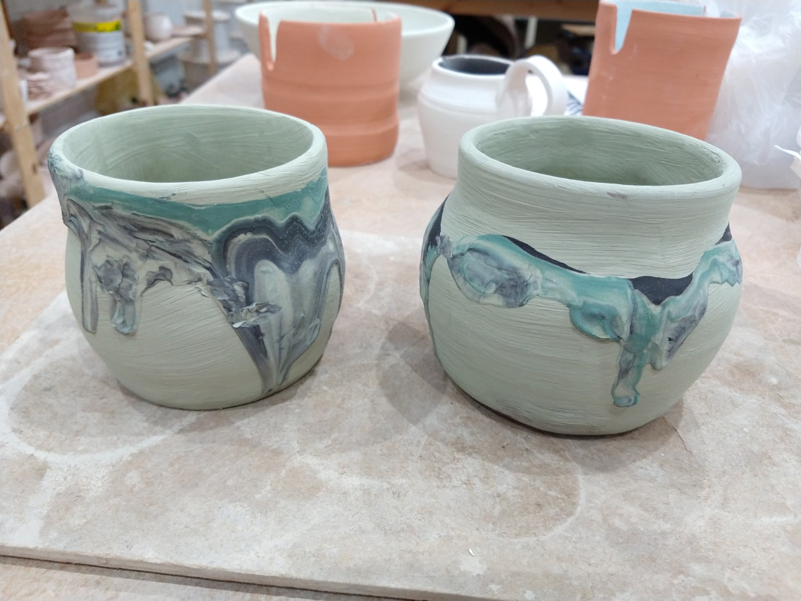 Mixed slip poured on pot