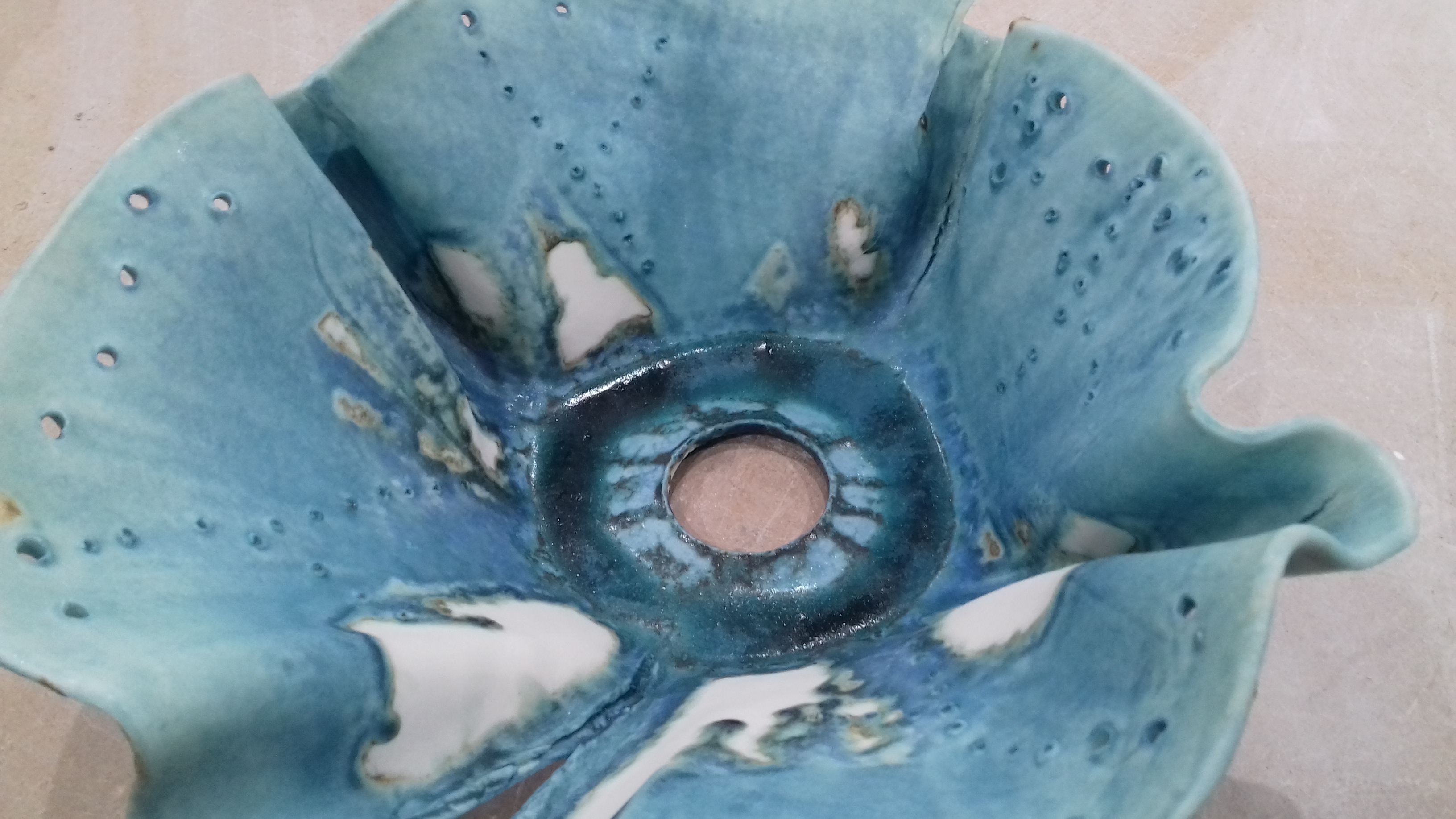 Too much glaze means lots of runs on porcelain