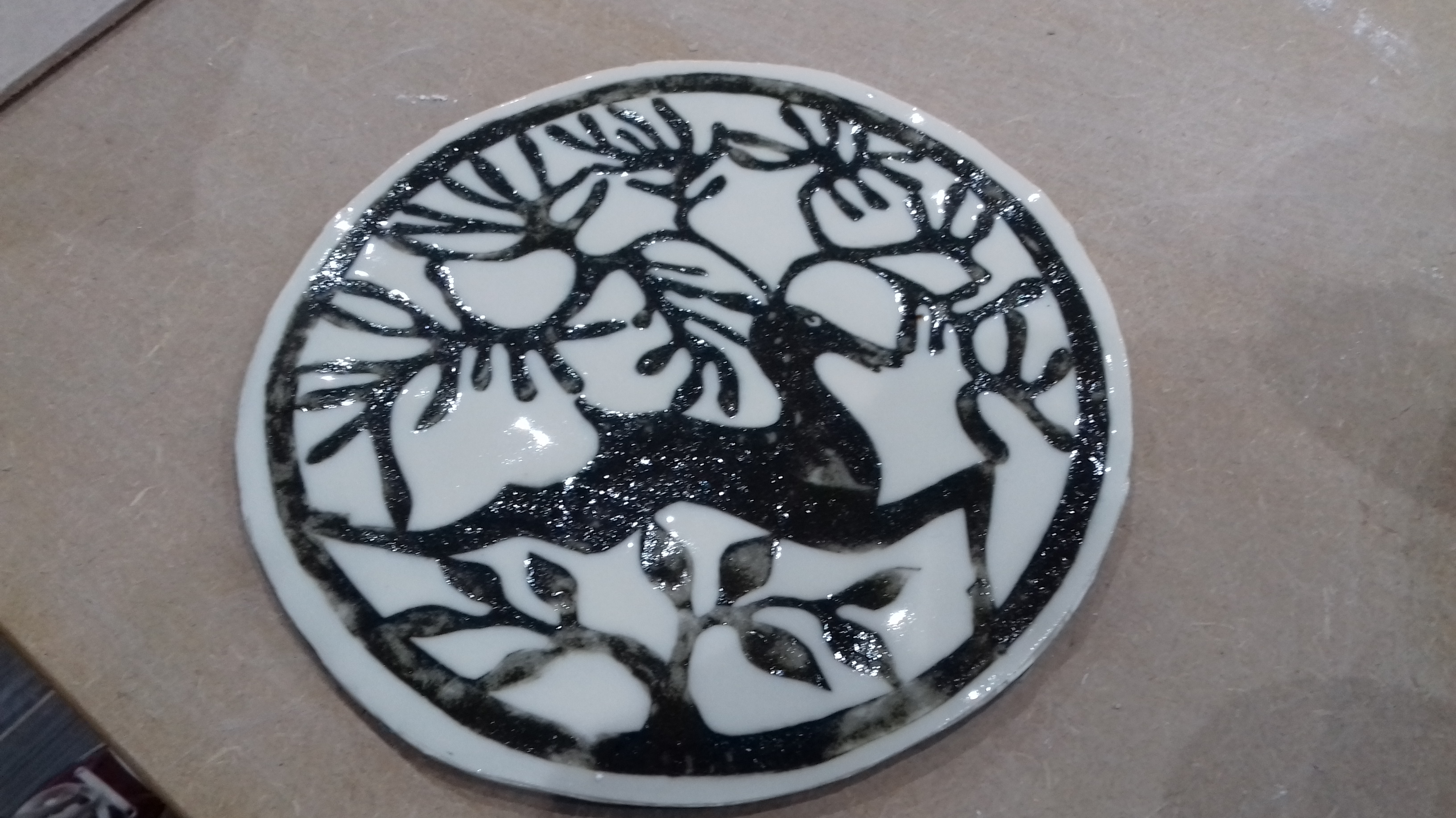 Plaque with black slip decoration