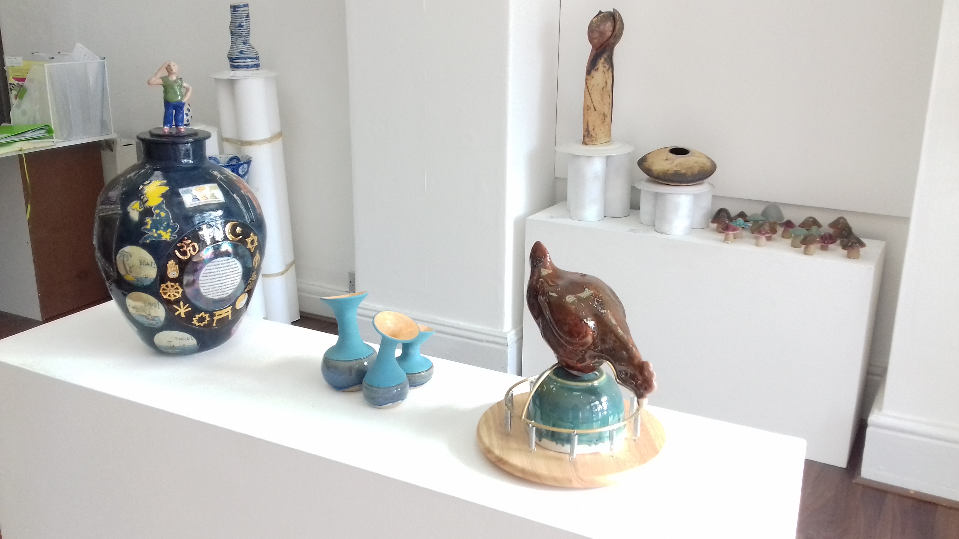 In an exhibition - Mary Morgan big pot and Simon Wolf small blue and Spring Chicken