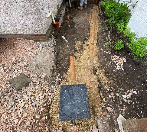 Underground pipework exposed shallow