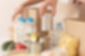 volunteers-putting-canned-food-donation-box.jpg