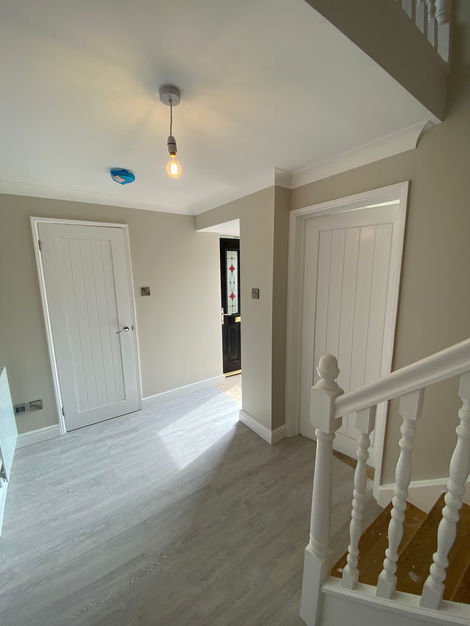 Stylish Entryway & Staircase Redecoration
Step into elegance — fresh neutral walls, crisp white woodwork, and contemporary grey flooring come together for a clean, timeless welcome. From subtle lighting to staircase detailing, everything’s been considered.
