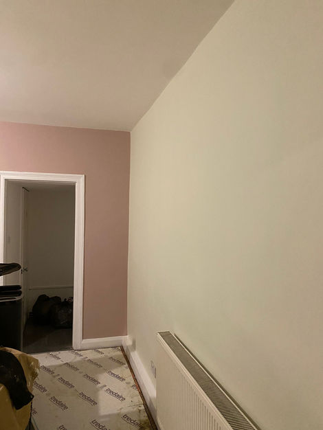 Part of a comprehensive interior update by Joseph O’Neill Decorating Contractors @jdcltd.info , this clean and crisp entrance way sets the tone for the rest of the home. The light pastel green walls bring a soft, welcoming feel while complementing the bright white front door and trims. The paint job is smooth with sharp edging, and the modern UPVC door with frosted glass keeps the space well-lit yet private. Simple, neat, and functional.