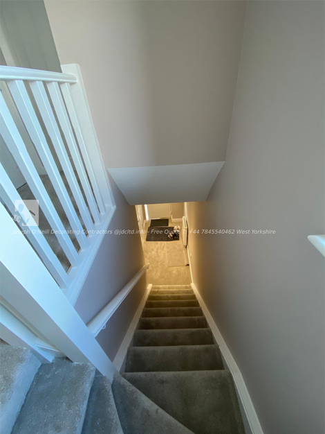 Bright, clean, and timeless.
A freshly decorated stairwell with calming neutrals and sharp white finishes makes every step feel inviting. Professional decorating you can trust.