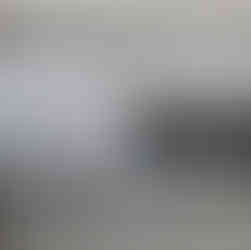 Sign titled "THE ROYAL YACHT BRITANNIA MAINTENANCE" with an image of a team in navy uniforms. Details about maintenance work and charitable trust info.