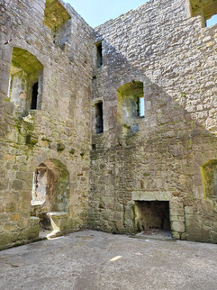 A view of the ground floor room of the tower house at Lochleven Castle.