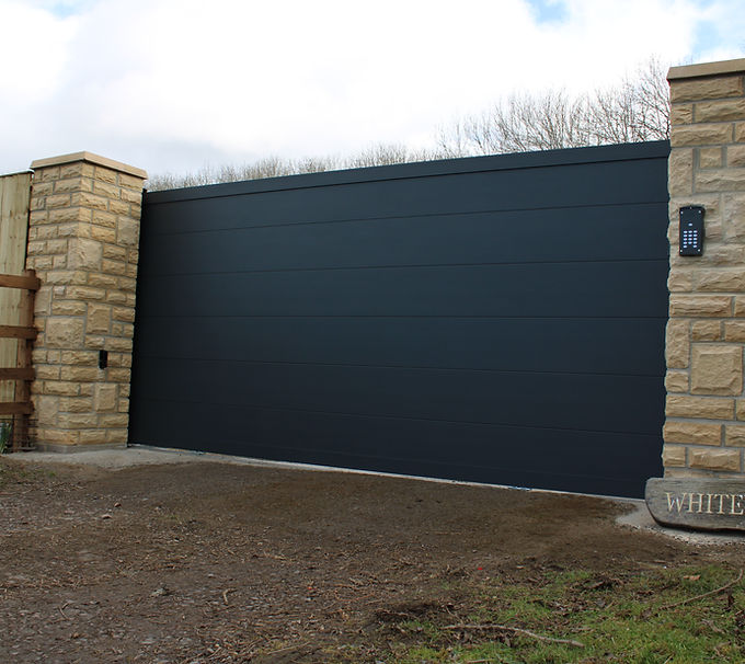 Track sliding gate with electric gate motor and intercom