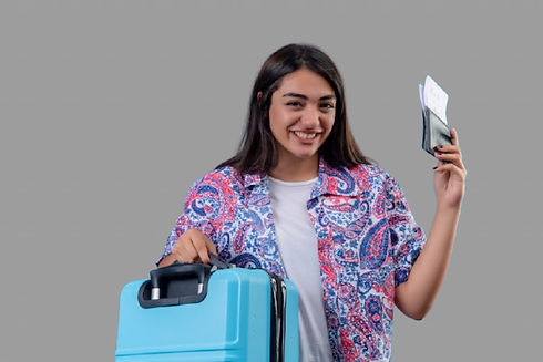 Happy woman holding flight ticket and luggage after on-time Banbury airport taxi service