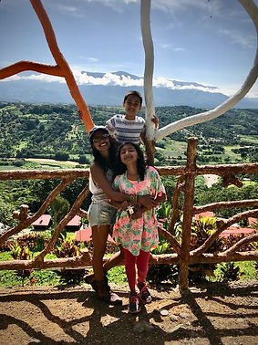 Annalisa Raghunandan, real estate broker and relocation specialist at Chirripo Properties, with her children in the Chirripo Valley, Costa Rica.